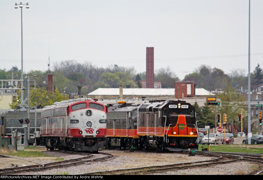 The deadhead move of Iowa Pacific equipment led by freshly repainted SLRG 4137 gets underway